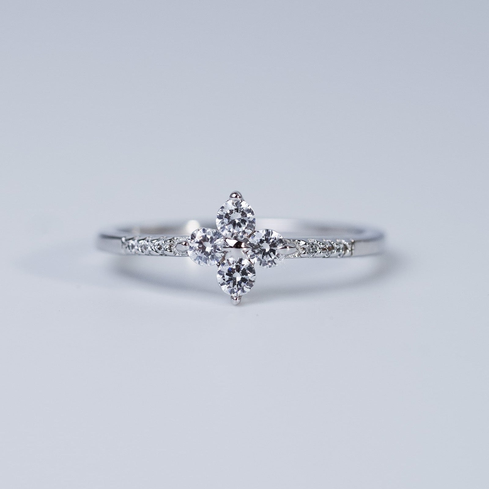 Four Stone Simluated Flow Diamond Ring