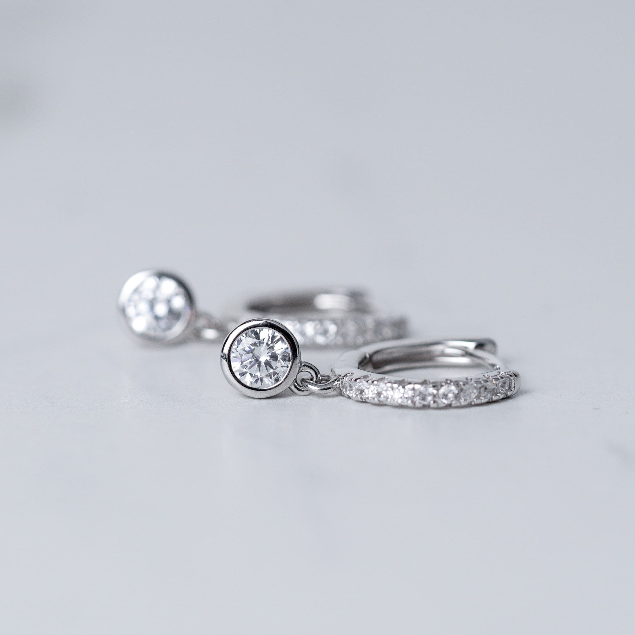 Small Hoop With Single Drop Diamond Earrings - Bezel